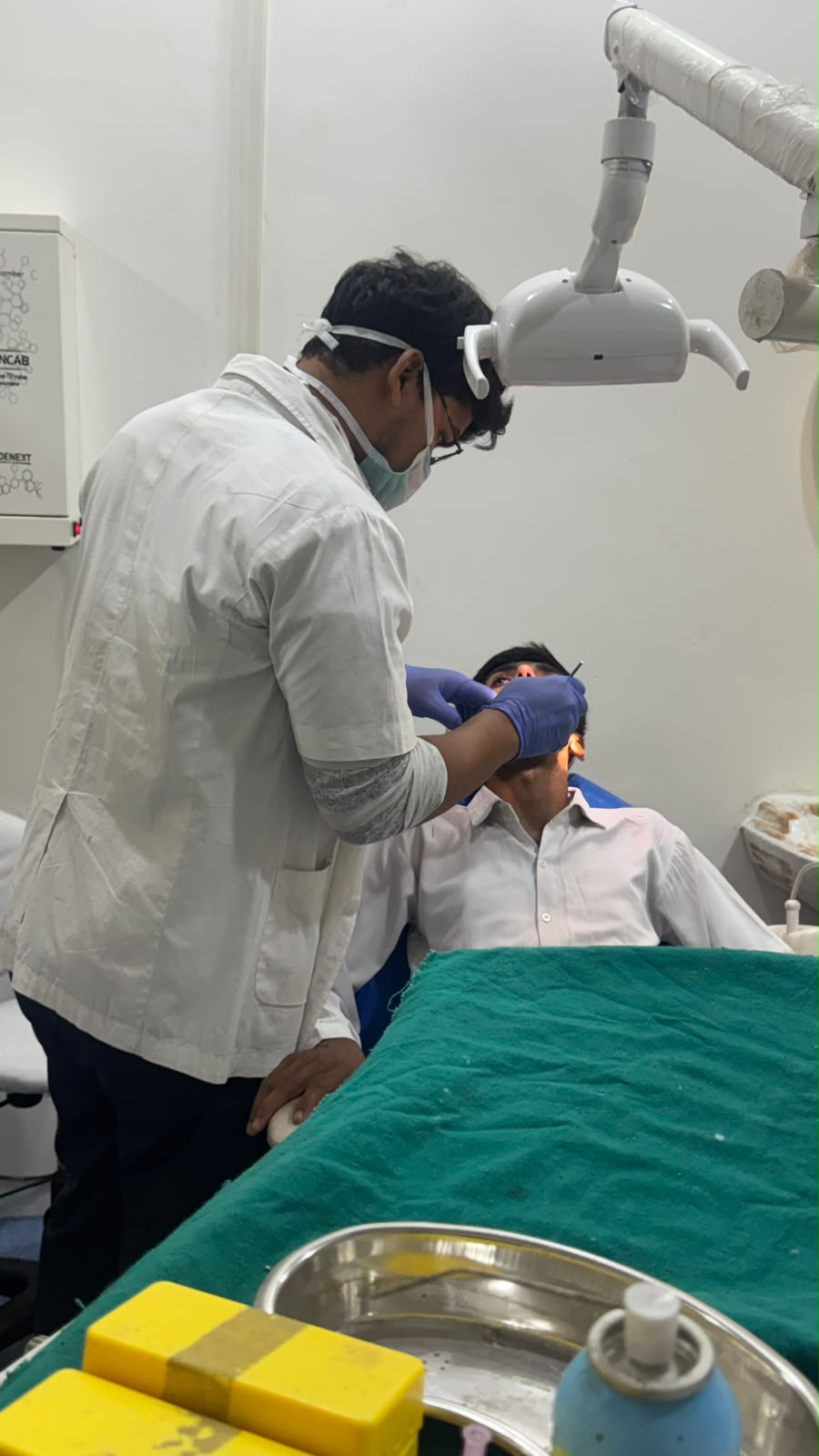 Dr. Rafique performing treatment session